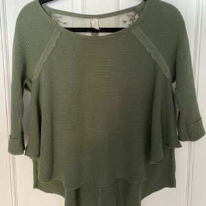 Free People shirt with lace design.